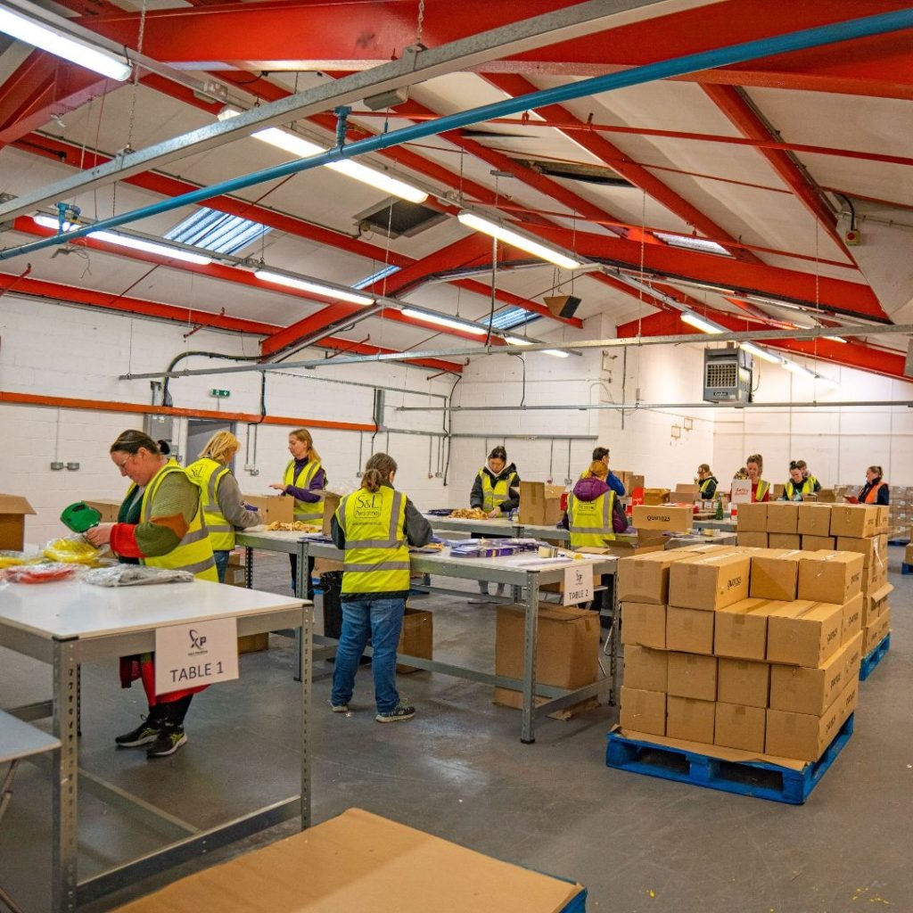 Xact Packing contract packing team at work in Loughborough